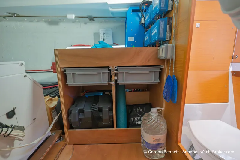 Slide: The Image of Interior storage area of a 2015 Jeanneau Sun Odyssey 439 yacht with organized equipment. - 71