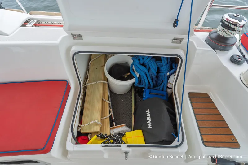 Slide: The Image of Storage compartment on 2015 Jeanneau Sun Odyssey 439 yacht, containing ropes and equipment. - 30