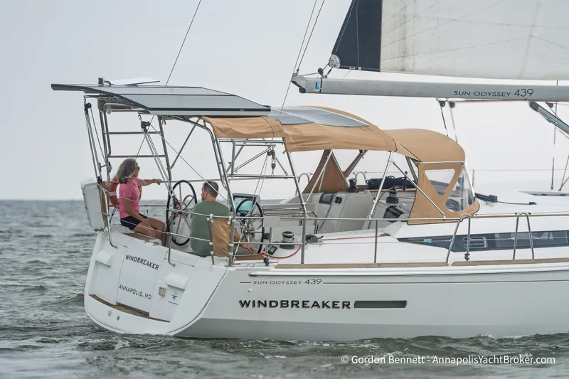 Slide: The Image of 2015 Jeanneau Sun Odyssey 439 sailboat "Windbreaker" sailing with two people onboard. - 2