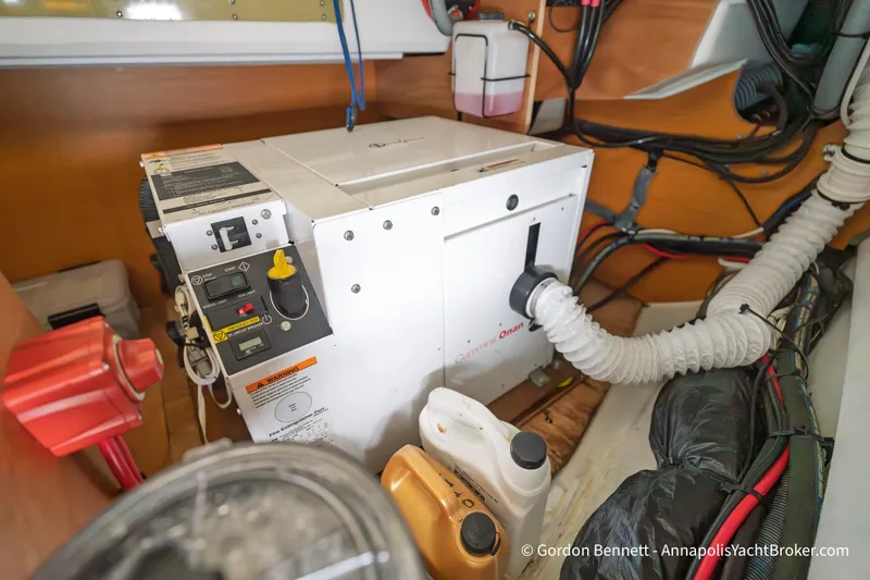 Slide: The Image of Engine room of 2015 Jeanneau Sun Odyssey 439 yacht with Cummins Onan generator. - 60