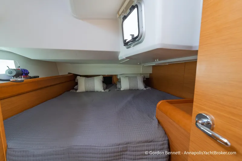 Slide: The Image of Cozy cabin interior of 2015 Jeanneau Sun Odyssey 439 yacht with double bed. - 52