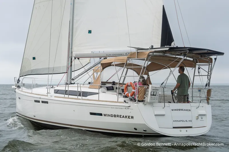 Slide: The Image of 2015 Jeanneau Sun Odyssey 439 sailboat "Windbreaker" sailing on open water. - 1