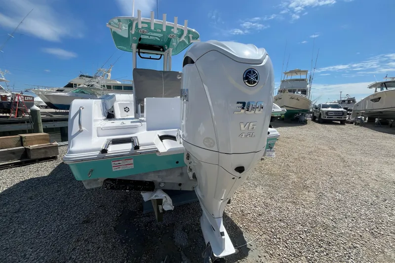 Slide: The Image of 2024 Sportsman Heritage 231 Center Console boat with Yamaha 300 V6 engine. - 3
