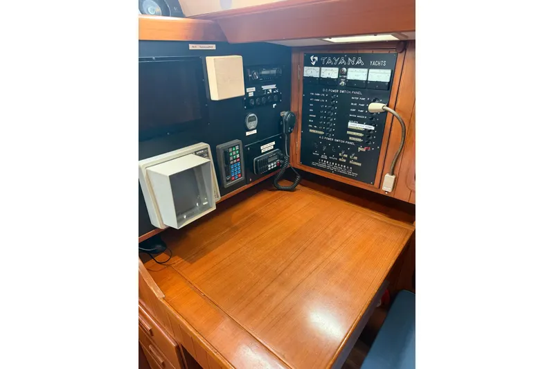 Slide: The Image of Control panel of 1989 Tayana Vancouver 42 yacht with navigation equipment. - 25