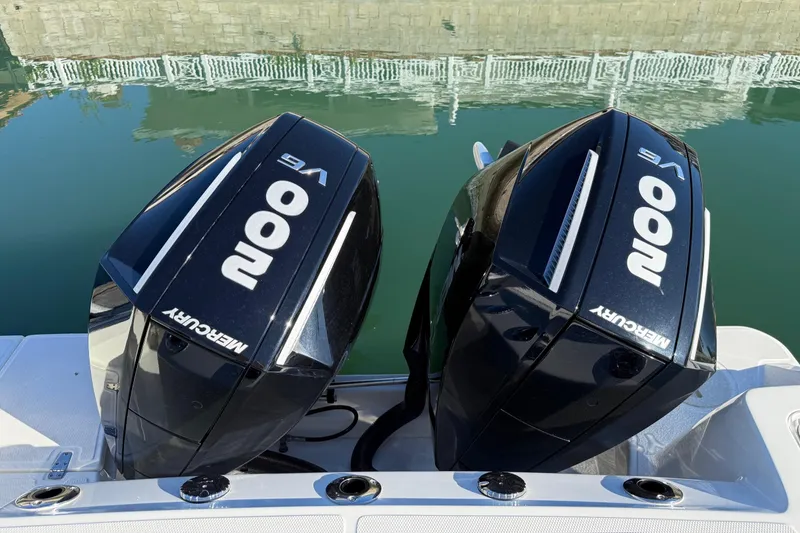 Slide: The Image of Twin Mercury 300 outboard engines on a 2025 Boston Whaler 250 Outrage boat. - 18