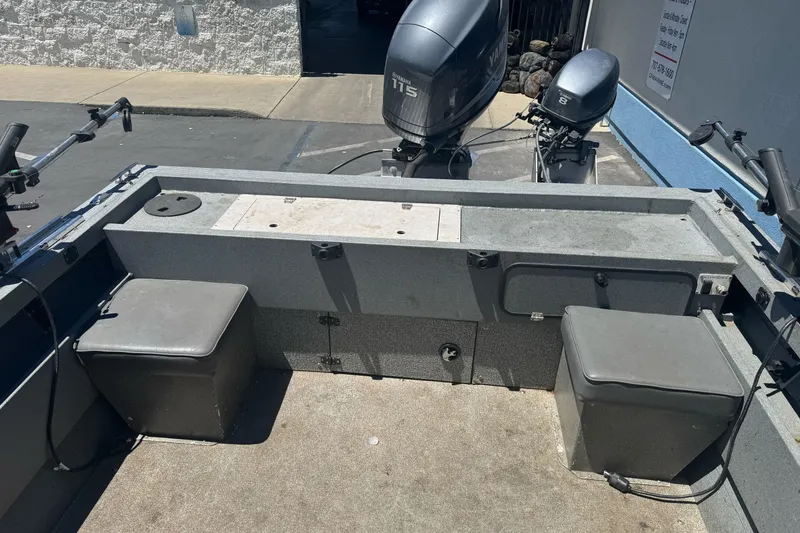 Slide: The Image of 2008 Duckworth Navigator Sport 195 boat interior with dual outboard motors. - 10