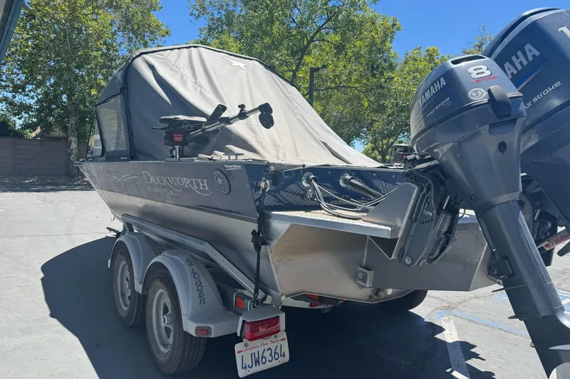 Slide: The Image of 2008 Duckworth Navigator Sport 195 boat with Yamaha motors on a trailer. - 4