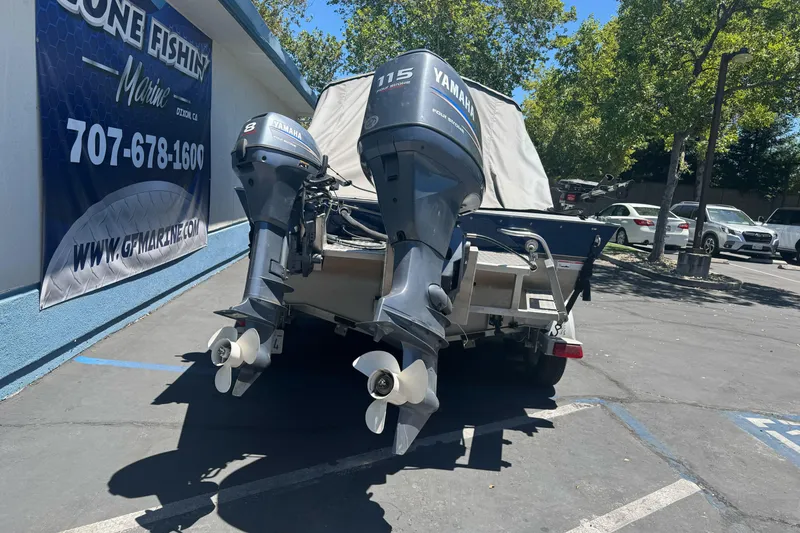 Slide: The Image of 2008 Duckworth Navigator Sport 195 with Yamaha outboard motors in parking lot. - 3