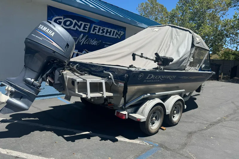 Slide: The Image of 2008 Duckworth Navigator Sport 195 boat with Yamaha motor, parked at Gone Fishin' Marine. - 2