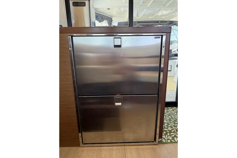 Slide: The Image of Stainless steel refrigerator on 2021 Lagoon 46 yacht interior. - 48