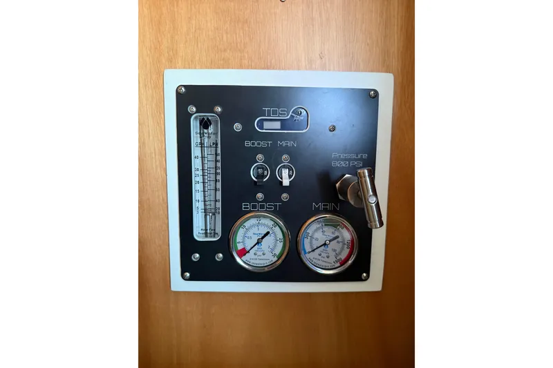 Slide: The Image of Control panel on 2021 Lagoon 46 yacht, featuring gauges and pressure indicators. - 87