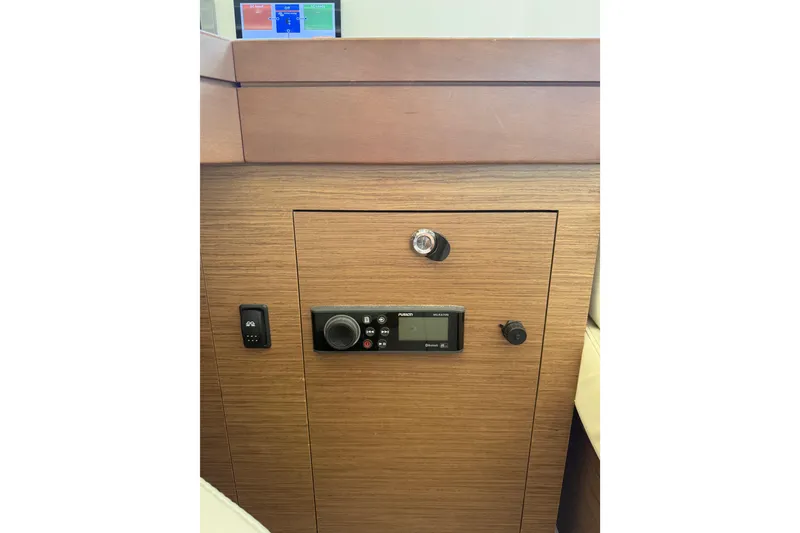 Slide: The Image of Control panel on 2021 Lagoon 46 yacht, featuring modern navigation equipment. - 56
