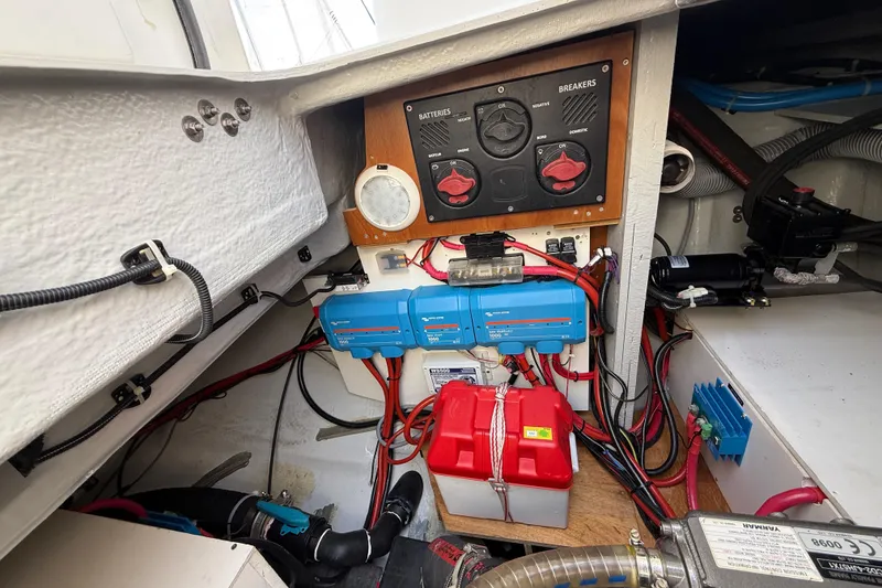 Slide: The Image of Electrical system of a 2021 Lagoon 46 yacht, featuring batteries and breakers. - 95