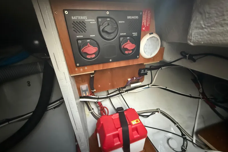 Slide: The Image of Electrical panel and battery setup in a 2021 Lagoon 46 catamaran. - 90