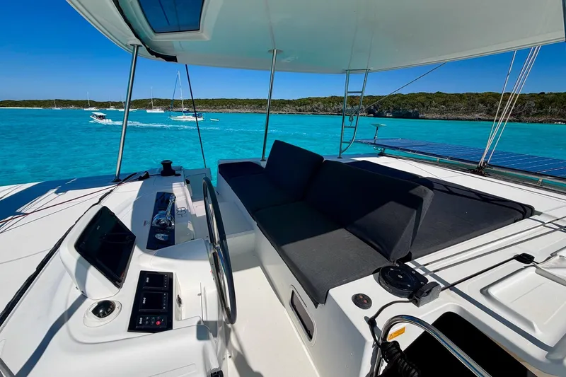 Slide: The Image of Luxurious Lagoon 46 catamaran, 2021 model, with spacious deck and stunning turquoise waters. - 14