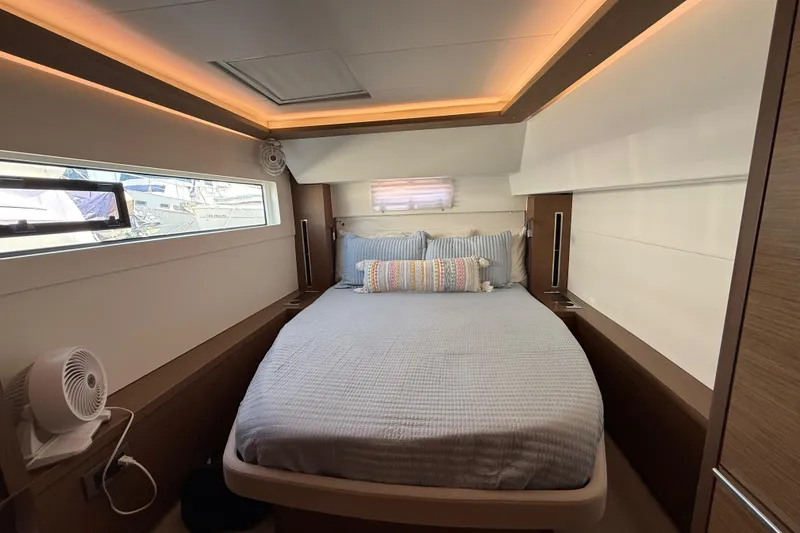 Slide: The Image of Luxurious cabin interior of 2021 Lagoon 46 yacht with cozy bed and modern design. - 69