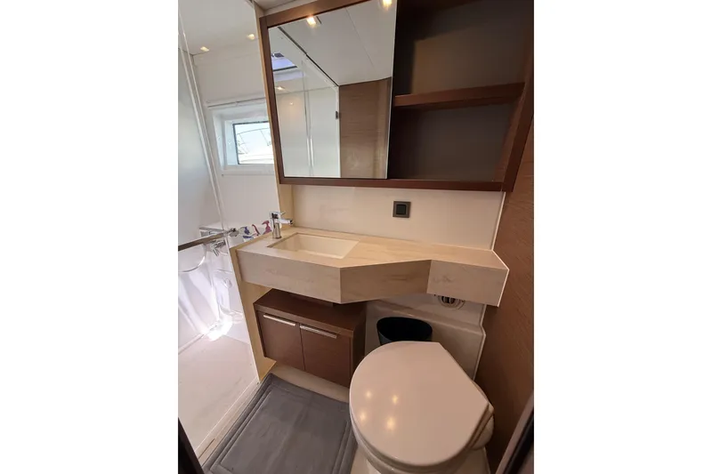 Slide: The Image of Modern bathroom interior on 2021 Lagoon 46 yacht, featuring sleek sink and mirror. - 71