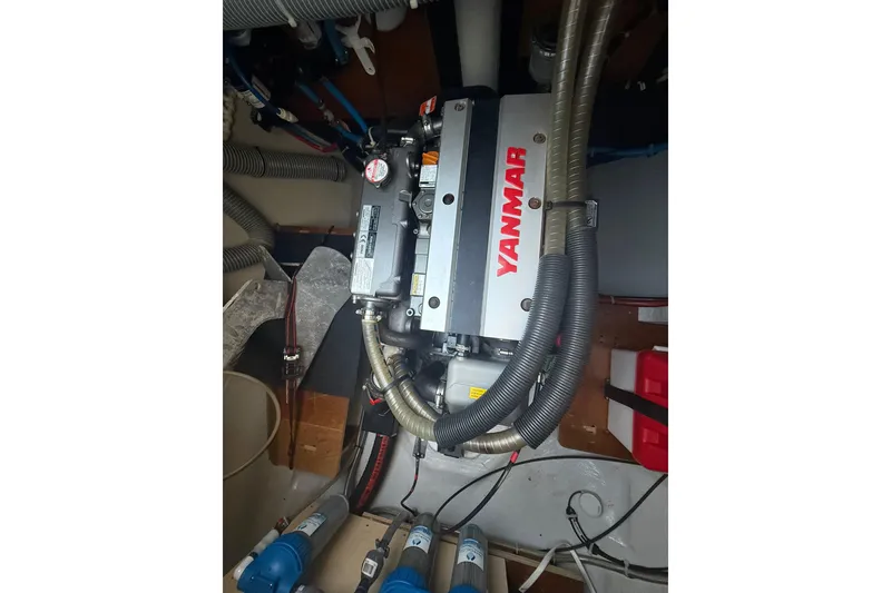 Slide: The Image of Engine compartment of a 2021 Lagoon 46 catamaran featuring a Yanmar engine. - 88