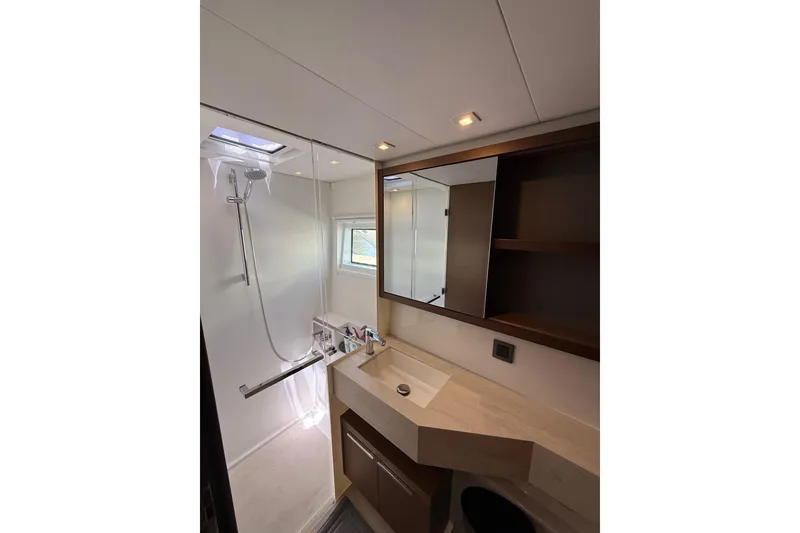 Slide: The Image of Modern bathroom interior of 2021 Lagoon 46 yacht with shower and sink. - 70