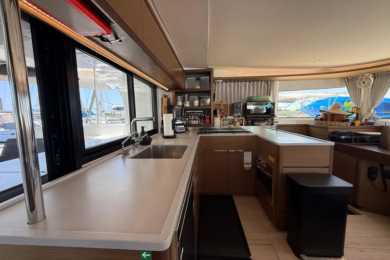 Slide: The Image of Modern kitchen interior of 2021 Lagoon 46 catamaran with sleek countertops and appliances. - 42