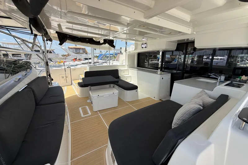 Slide: The Image of Spacious 2021 Lagoon 46 yacht interior with modern seating and sleek design. - 32