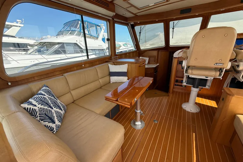 Slide: The Image of Luxurious interior of 2013 Sabre 42 Salon Express yacht with leather seating and wooden accents. - 31