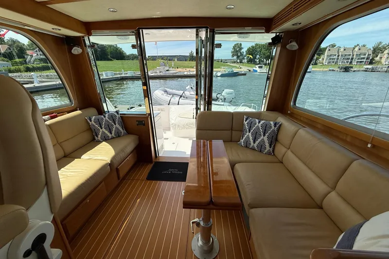 Slide: The Image of Luxurious interior of 2013 Sabre 42 Salon Express yacht with waterfront view. - 35