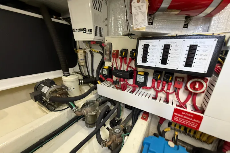 Slide: The Image of Engine room of 2013 Sabre 42 Salon Express with electrical panel and wiring. - 78