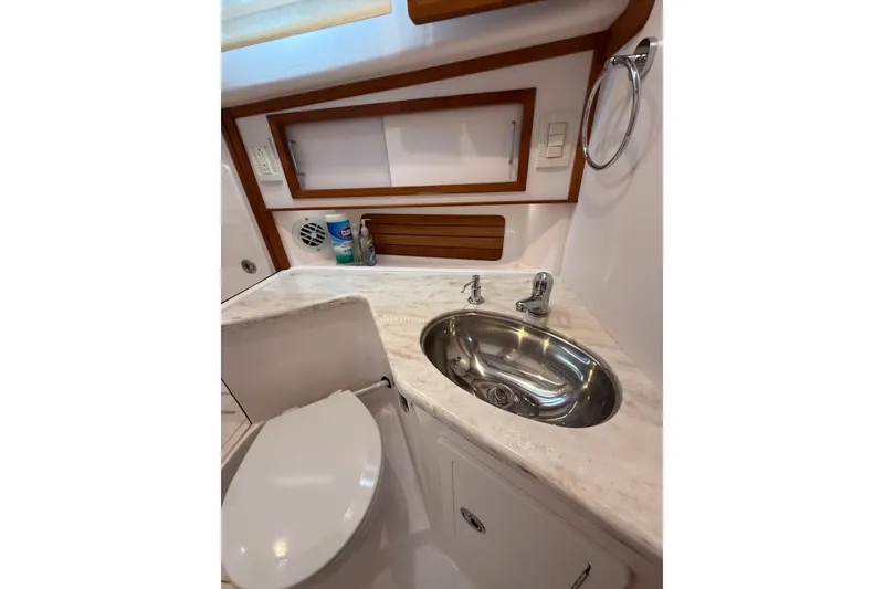 Slide: The Image of Luxurious bathroom interior of 2013 Sabre 42 Salon Express yacht with sink and toilet. - 70