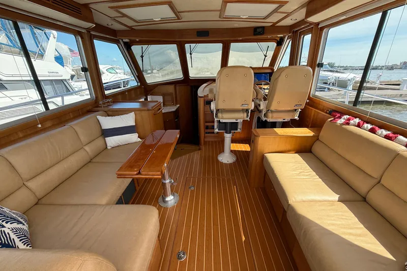 Slide: The Image of Interior of 2013 Sabre 42 Salon Express yacht with luxurious seating and helm station. - 30