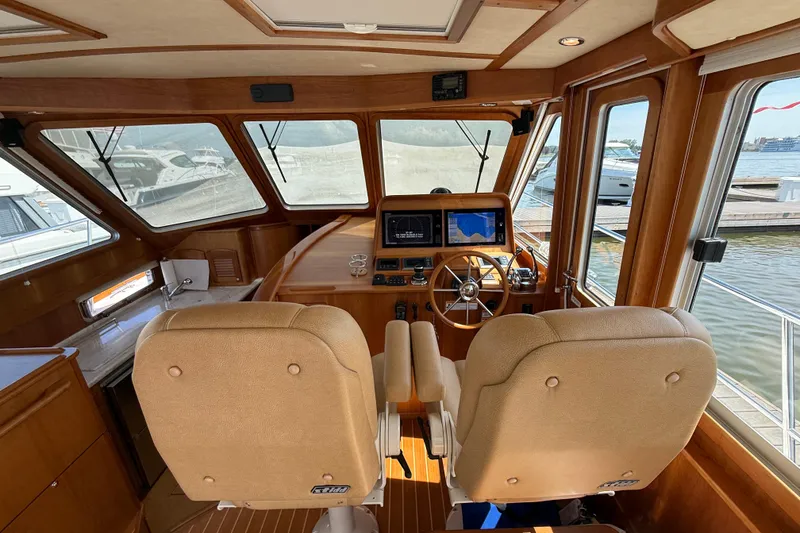 Slide: The Image of Interior of 2013 Sabre 42 Salon Express yacht with helm and navigation equipment. - 41