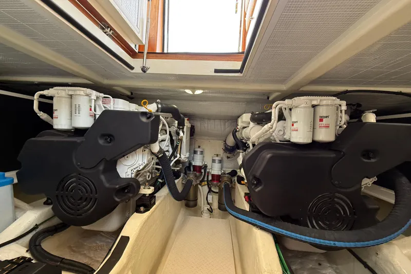 Slide: The Image of Engine room of 2013 Sabre 42 Salon Express with dual engines and filtration systems. - 72