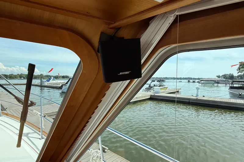 Slide: The Image of Interior view of 2013 Sabre 42 Salon Express yacht with Bose speaker, overlooking marina. - 59
