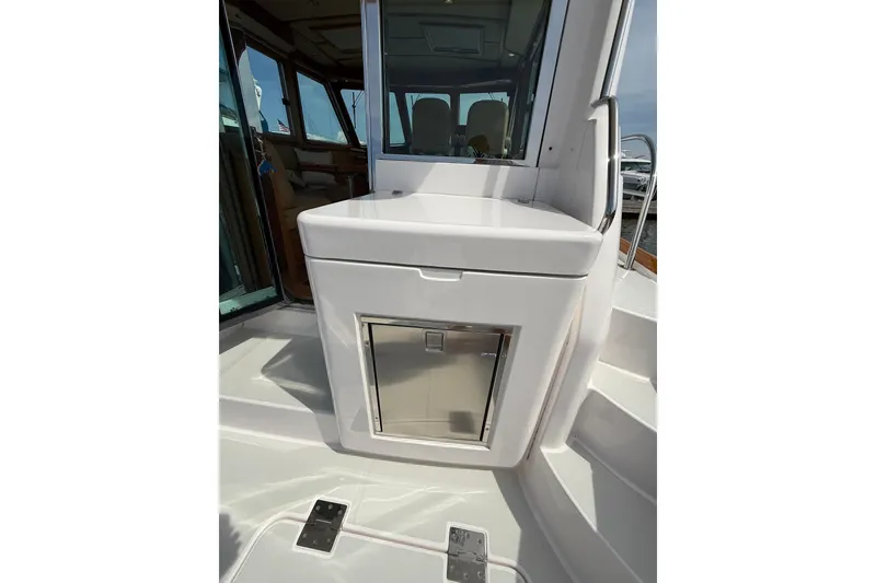 Slide: The Image of 2013 Sabre 42 Salon Express yacht deck with sleek cabinetry and modern design. - 18