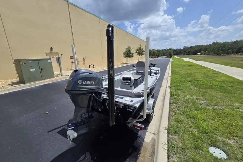 Slide: The Image of 2020 G3 Sportsman 1610 SS boat with Yamaha motor on trailer, parked outdoors. - 10