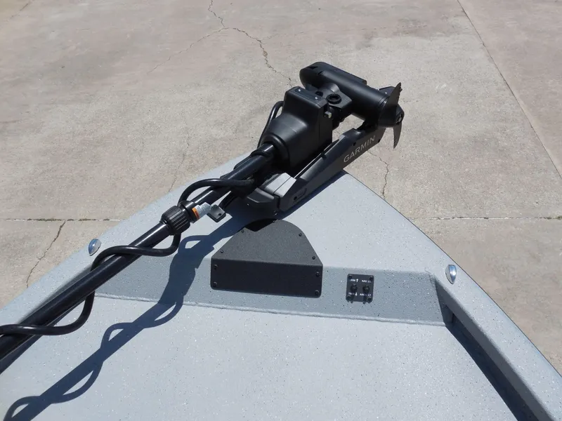 Slide: The Image of A Vexus ACX2000 boat with a Garmin motor mounted on the deck. - 18