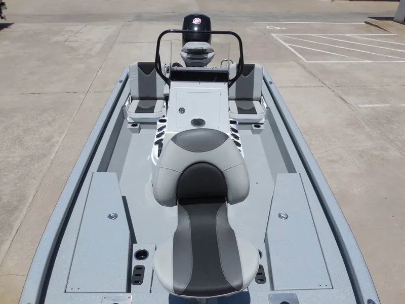 Slide: The Image of The image shows a 2026 Vexus ACX2000 boat with gray seating and an engine. - 19