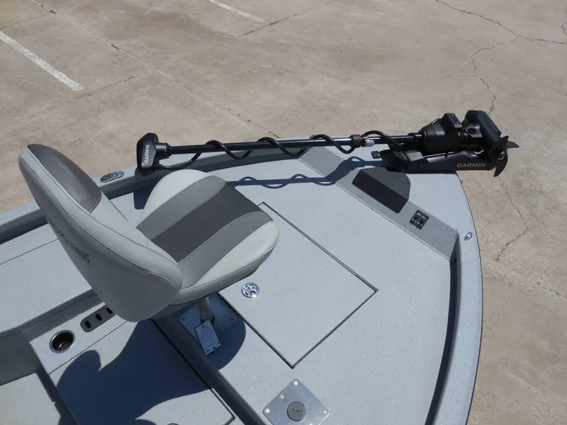 Slide: The Image of The image shows the deck of a Vexus ACX2000 boat with a seat and a Garmin motor. - 17