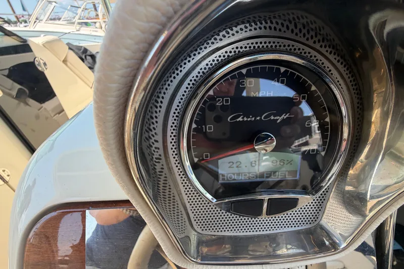Slide: The Image of Dashboard of 2023 Chris-Craft Launch 28 GT boat showing speedometer and fuel gauge. - 12