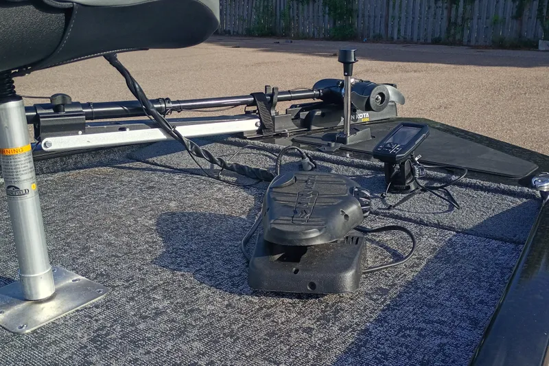 Slide: The Image of 2025 Tracker Pro 170 boat deck with trolling motor and navigation equipment. - 4