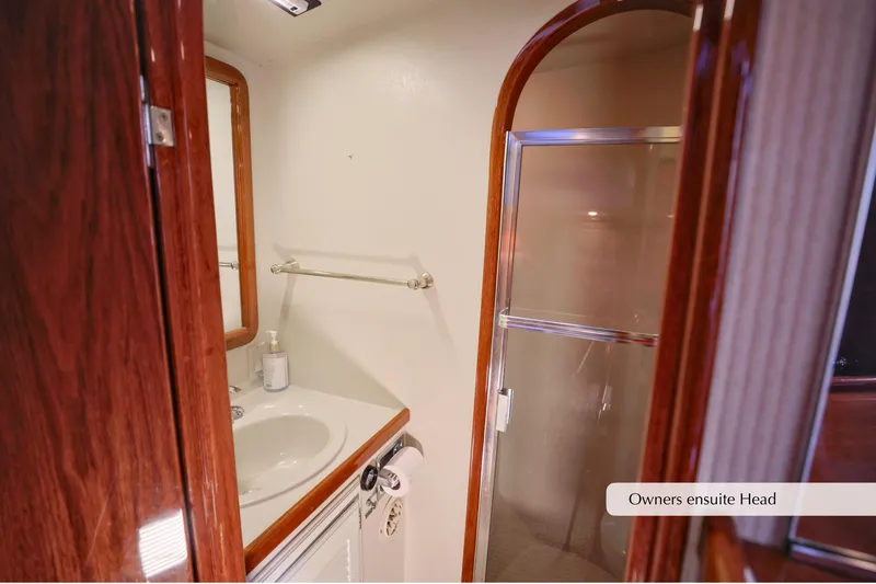 Slide: The Image of Luxurious 1996 Mediterranean convertible yacht bathroom with shower and sink. - 29