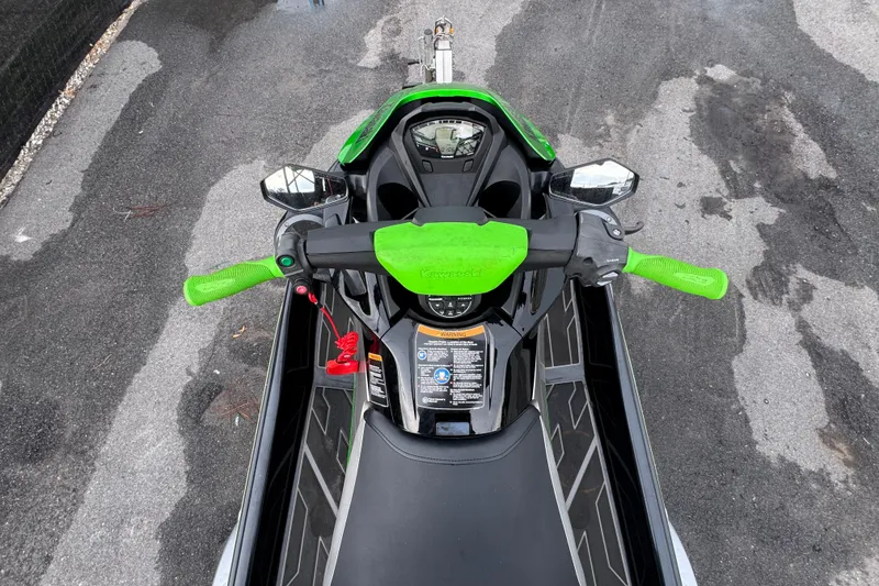 Slide: The Image of Top view of a 2020 Kawasaki Jetski STX 160LX with green handlebars. - 9