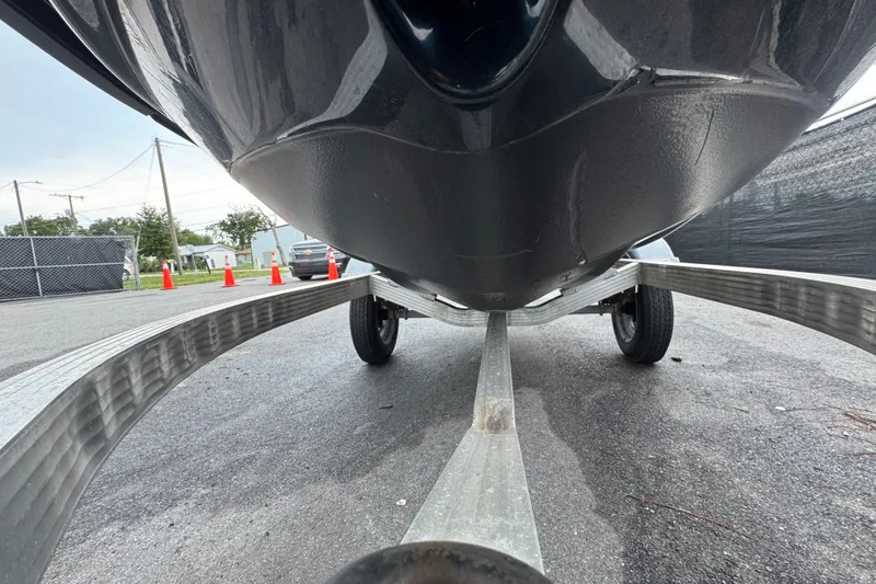 Slide: The Image of Underneath view of a 2020 Kawasaki Jetski STX 160LX on a trailer. - 15