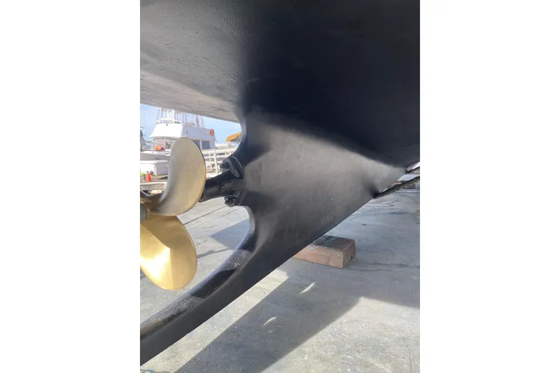 Slide: The Image of Propeller and hull of 1981 Hershine 40 boat in dry dock. - 29