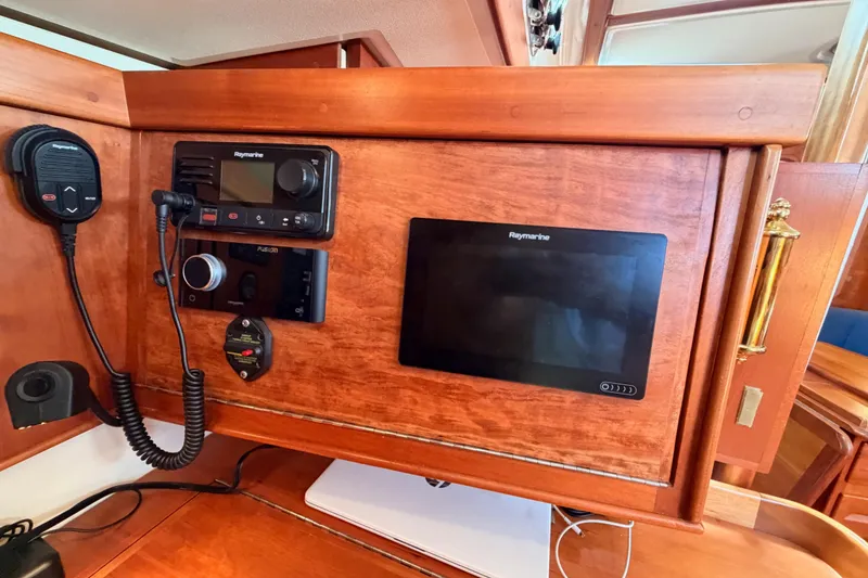 Slide: The Image of Control panel of a 2002 Tartan 3700 yacht with Raymarine electronics. - 52
