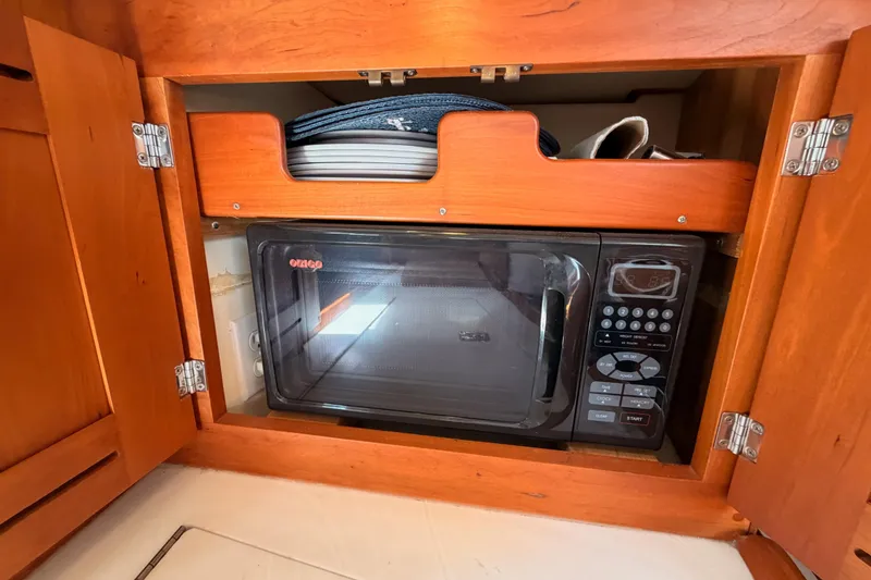 Slide: The Image of Microwave oven in wooden cabinet on Tartan 3700 yacht, 2002 model. - 66