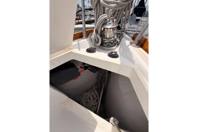 Slide: The Image of Tartan 3700 sailboat deck with ropes and winch, 2002 model. - 22