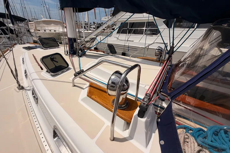Slide: The Image of Deck of 2002 Tartan 3700 sailboat with winches and ropes in marina. - 18