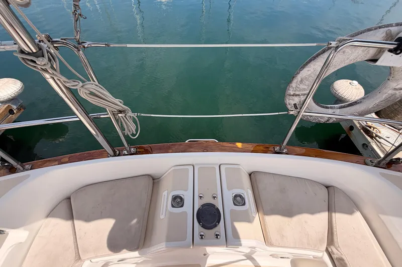 Slide: The Image of Cockpit view of 2002 Tartan 3700 sailboat with water reflection. - 29