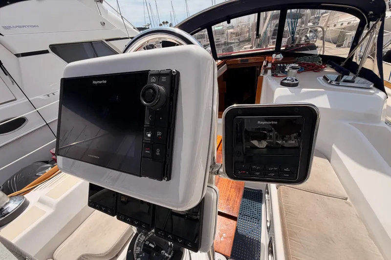 Slide: The Image of Cockpit of 2002 Tartan 3700 sailboat with Raymarine navigation equipment. - 41